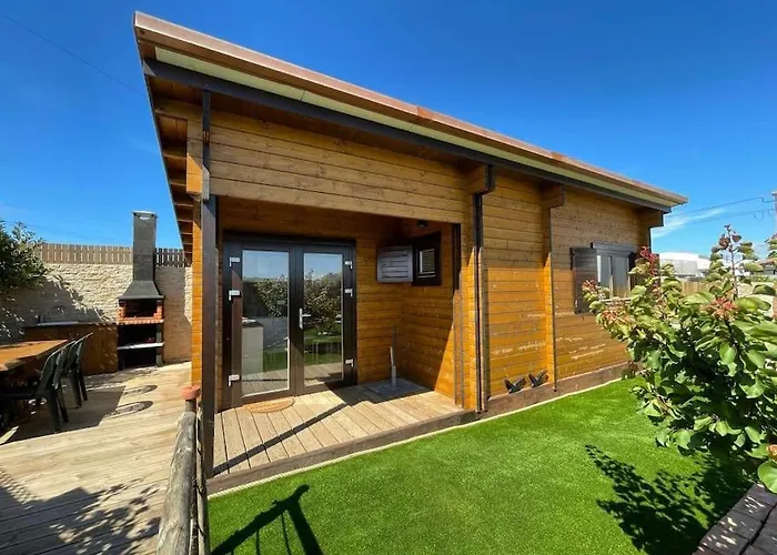 Casa Em Madeira Com Jardim Privado 別荘